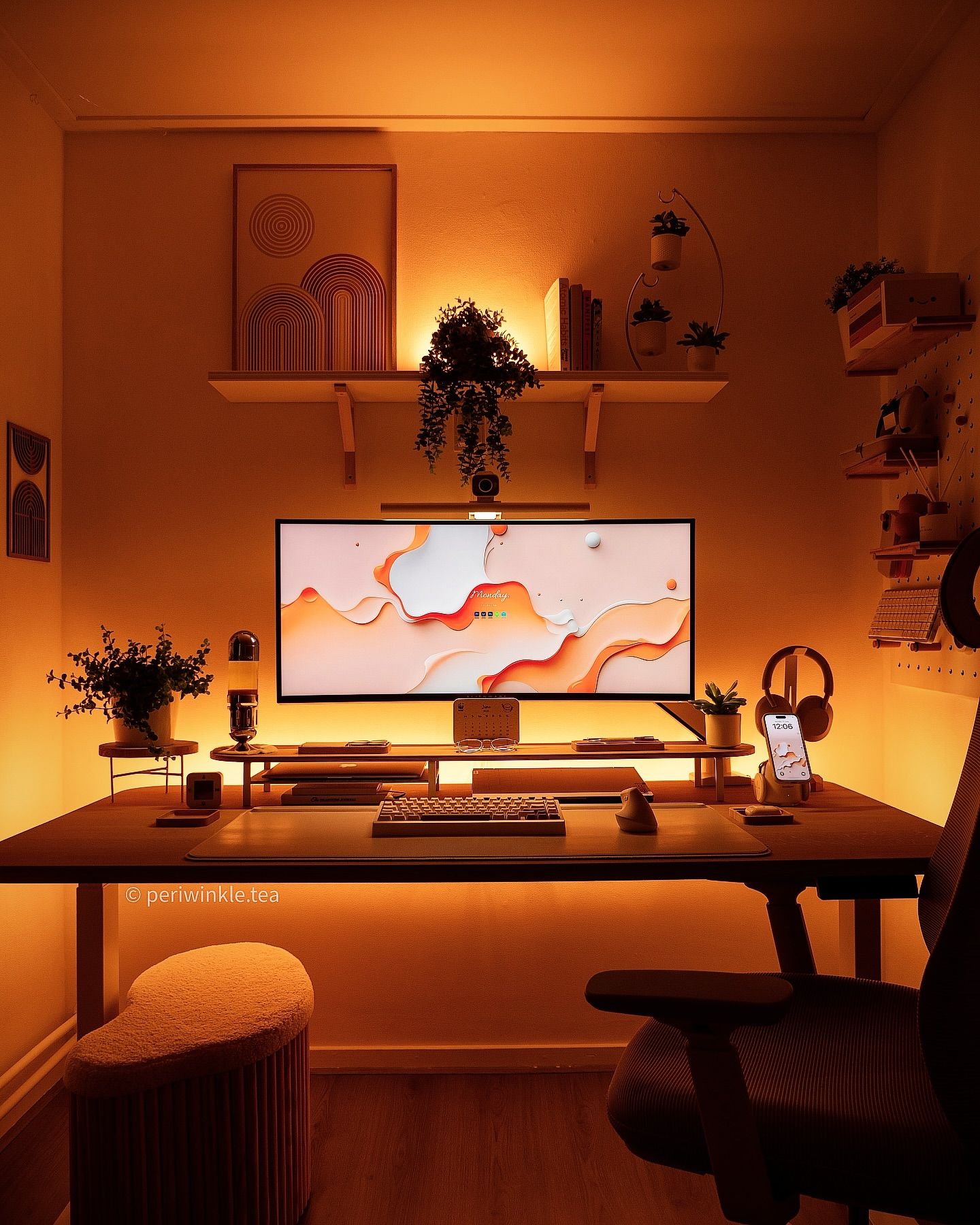 Clean desk with monitor showing game review notes
